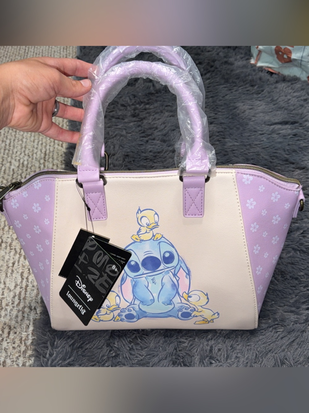 Loungefly Lilac and Cream Stitch Satchel with Pua Accent